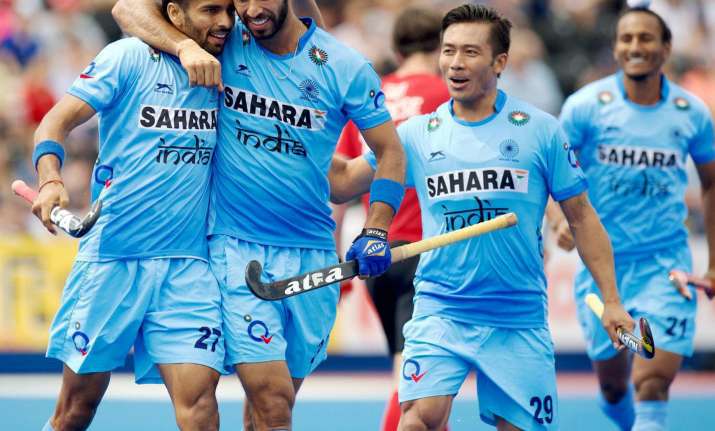 Indian hockey team wear black arm bands to condole attacks