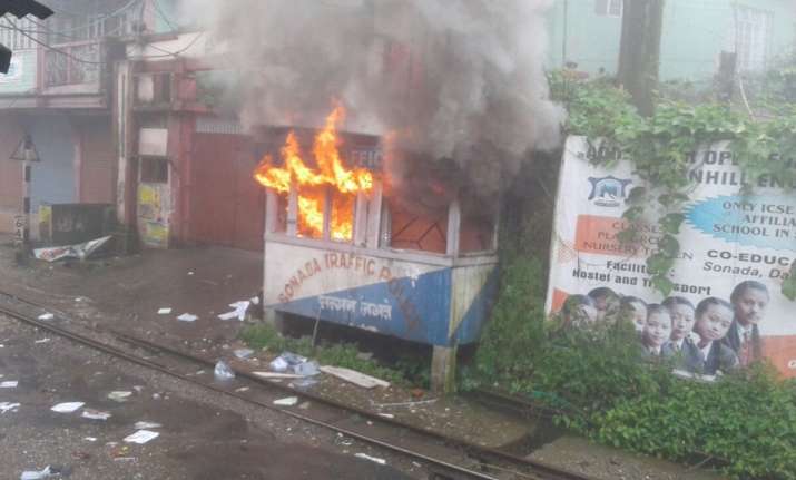 File pic:GJM supporters set a police outpost ablaze in