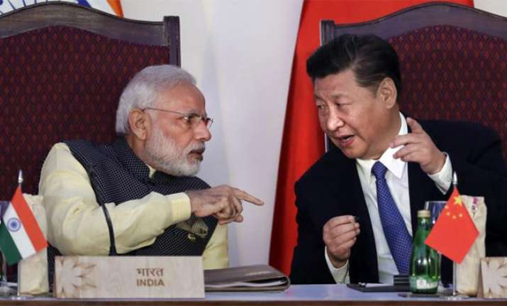 China says India should show willingness for peace through