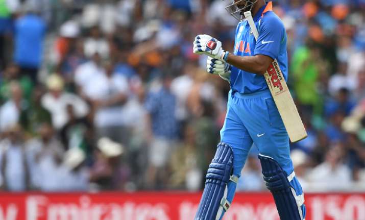 Shikhar Dhawan of India leaves the field