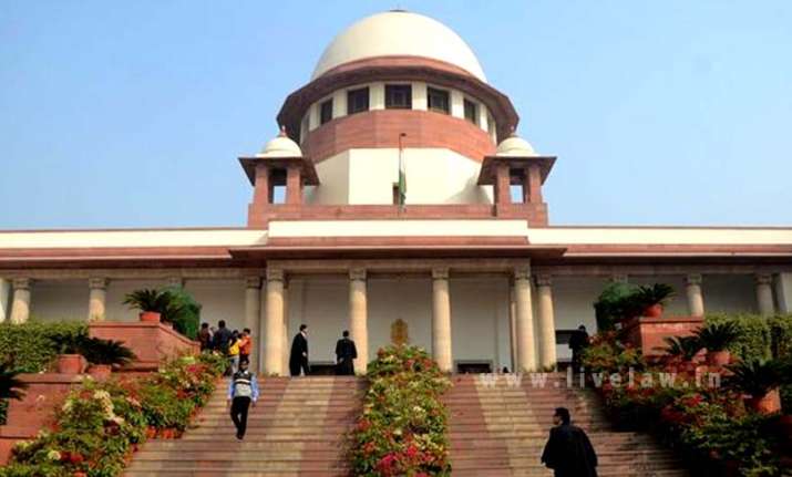 Highway liquor ban does not apply within city limits,