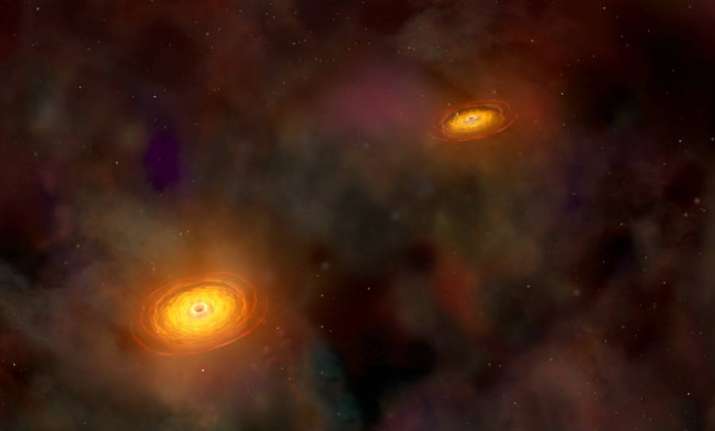 Astronomers spot elusive giant black hole couples