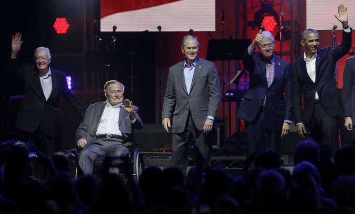 Former US presidents together at hurricane aid concert in