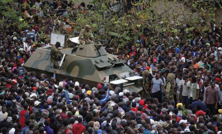 Zimbabweans say Mugabe must quit now, but more talks planned