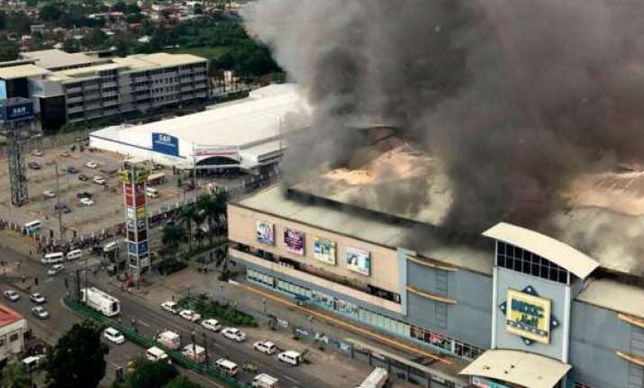 Dozens feared dead in Philippine mall inferno in President