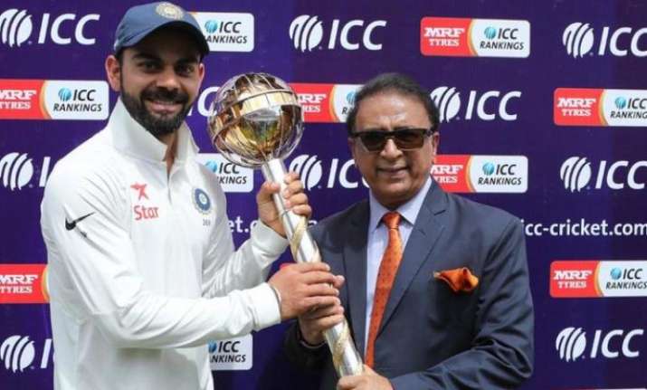 A file image of Virat Kohli holding the ICC Test mace