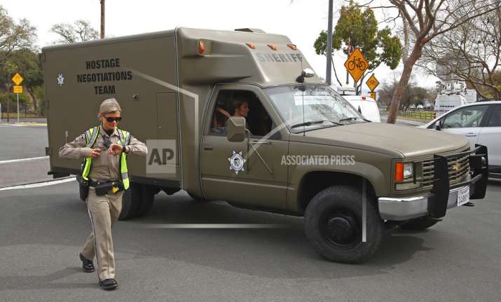 A sheriff's hostage negotiation team passes a California