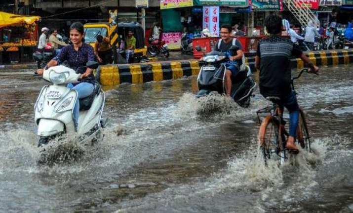 Waterlogged street during heavy rainfall, in Nagpur,