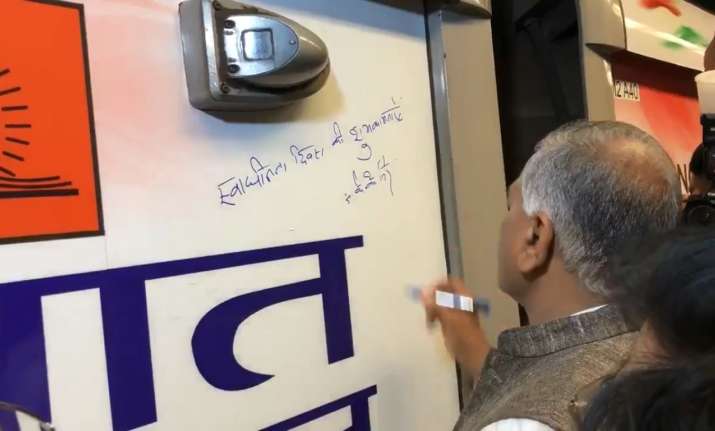 VK Singh flags off Freedom Express, a Metro train with a