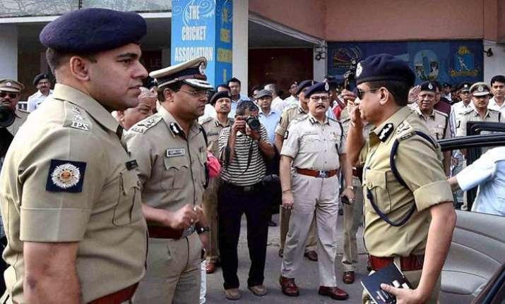Kolkata Police Commissioner Rajeev Kumar (R) at Eden