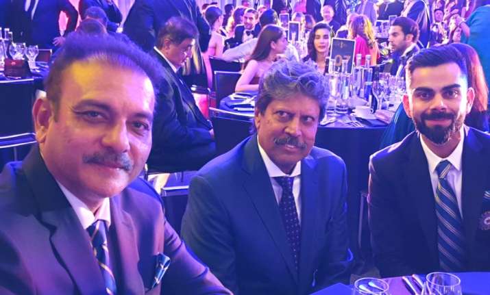 Ravi Shastri with Kapil Dev and Virat Kohli.
