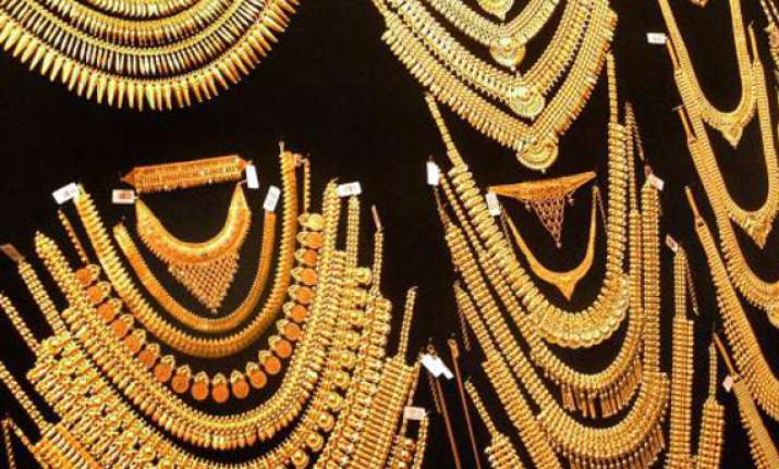 gold moves up by rs 260 silver by rs 500