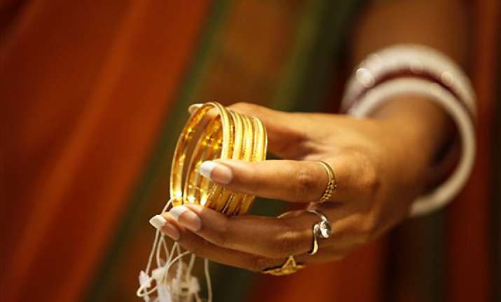 gold rises to two month high
