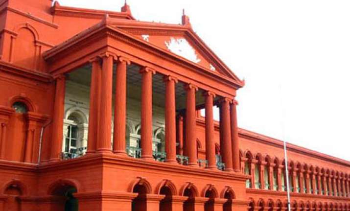 high court waits for rbi decision on bank penal charges for