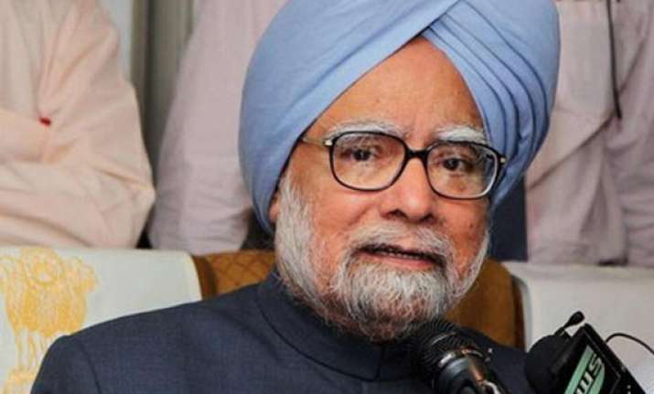 india committed to take hard decisions on economy pm tells
