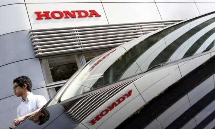 despite recalls honda records 20 profit rise on yen