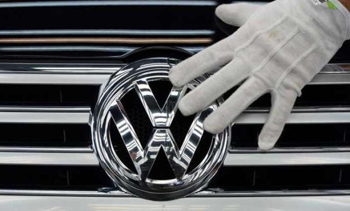 volkswagen suffers first quarterly loss in 15 years lowers