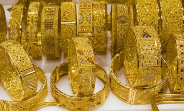 gold slides amid global worries silver hits multi year low