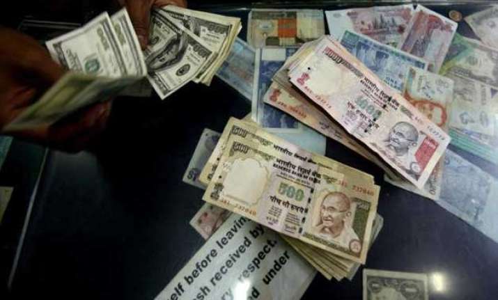 rupee drops to one week low of 63.41 vs dollar down 12 paise