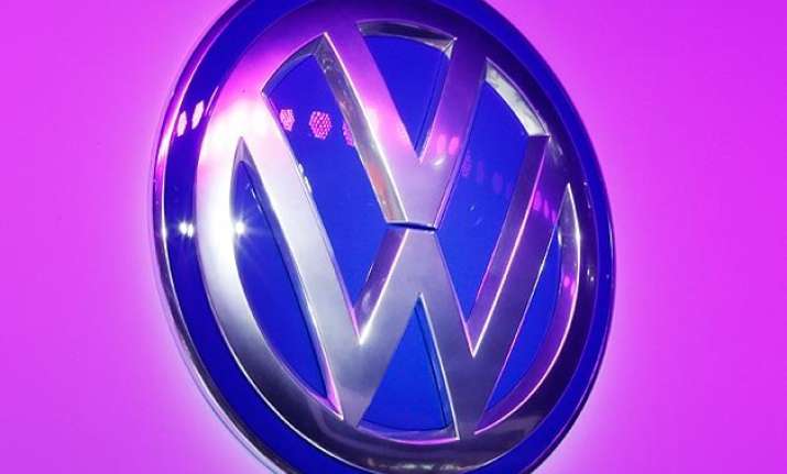 volkswagen sets aside 7.3 billion over emissions scandal