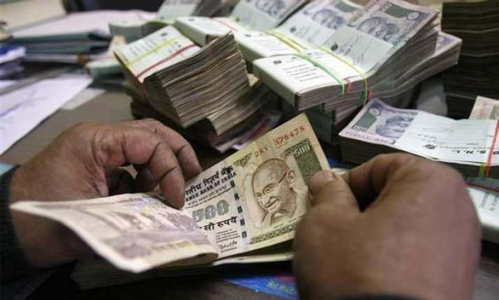 rupee hits 2 week low of 64.01 vs dollar down 3 paise