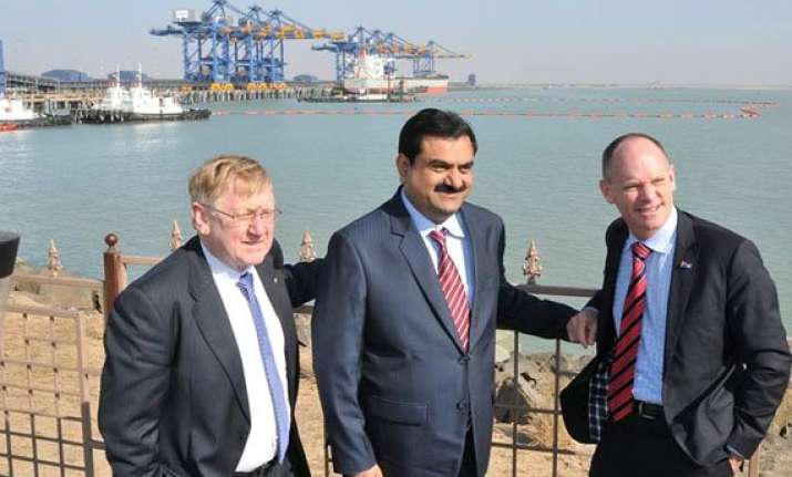 sbi to take final call on adani s loan in 2 3 months