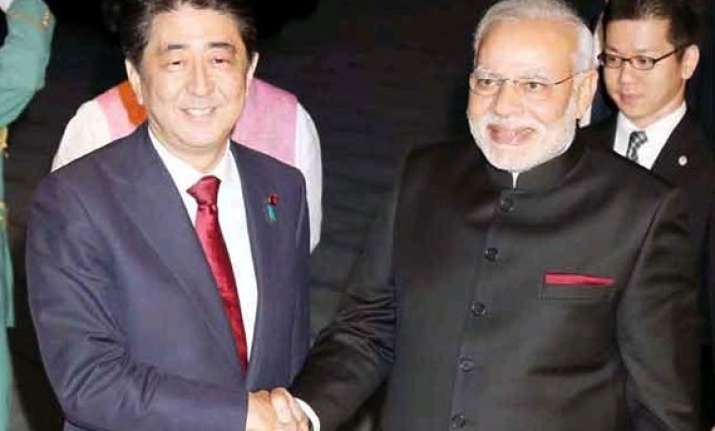 pm modi arrives in tokyo to hold summit talks with abe