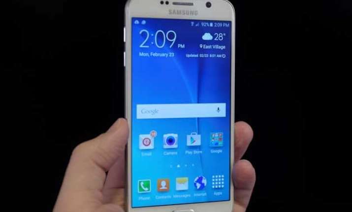 samsung s profit shrink 39 as more people switch to bigger