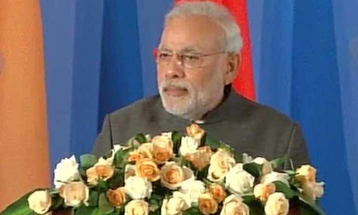 pm modi calls for harmonious partnership between india