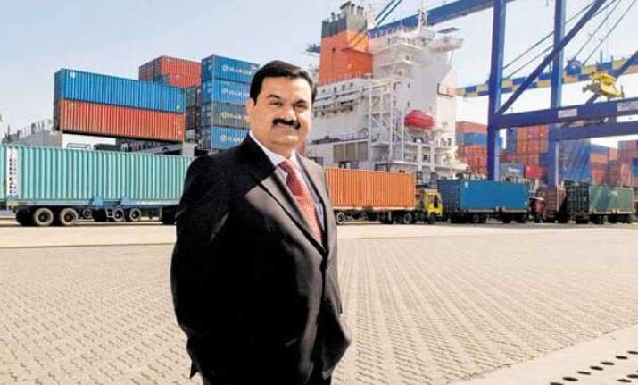adani suspends contractors on biggest australia coal