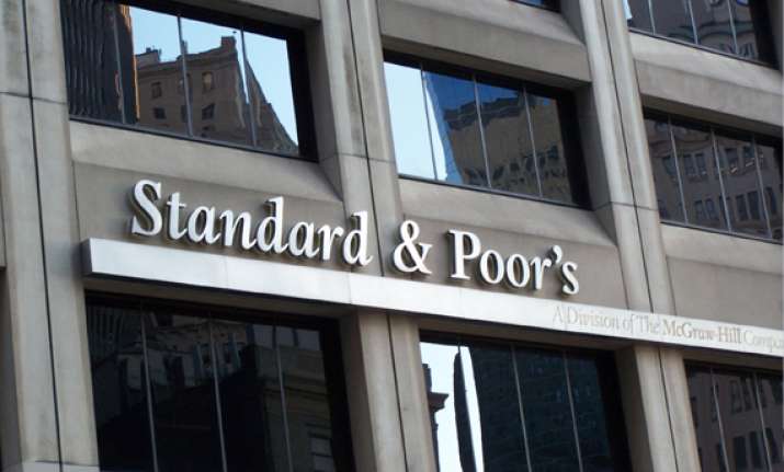 india rejects s p s warning of downgrading its credit rating