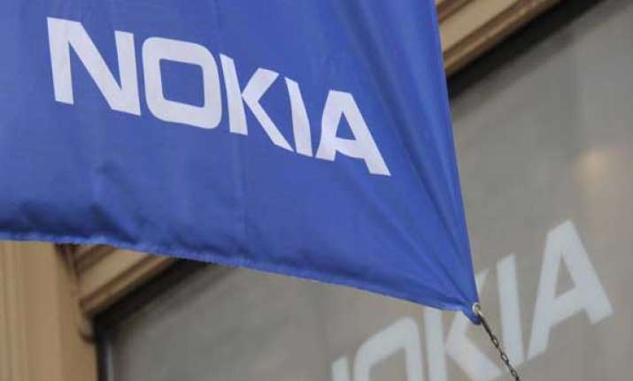 mobile unit drags down nokia q1 results despite sale