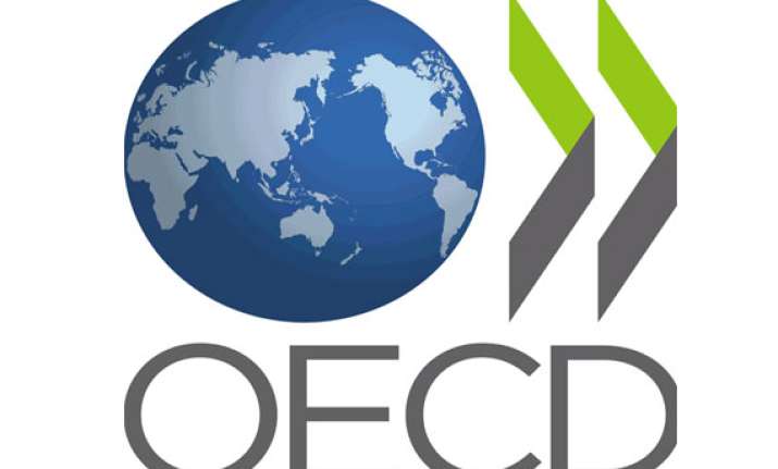 oecd cuts global economic growth forecast to 3.4 percent