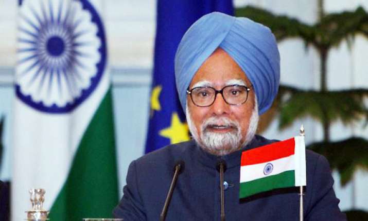 pm consults ministers on 2g spectrum auction