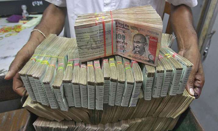 rupee ends unchanged at 61.79 against dollar