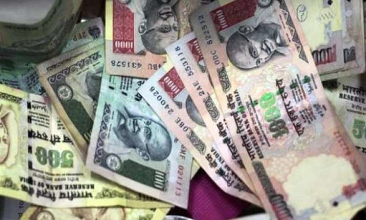 rupee sinks to 10 month low at rs 56.17 a dollar