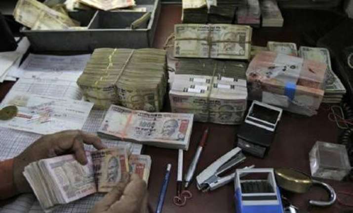 rupee tumbles by 62 paise against dollar