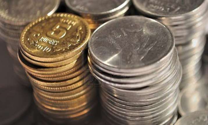 rupee gains 44 paise to close below 50 mark