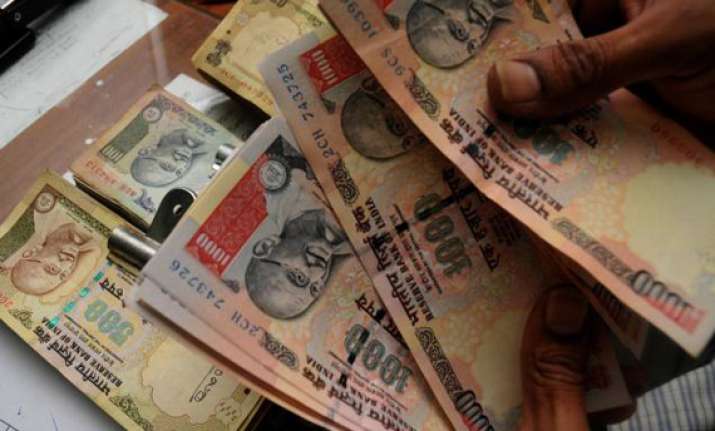 rupee erases initial gains closes 3 paise down against