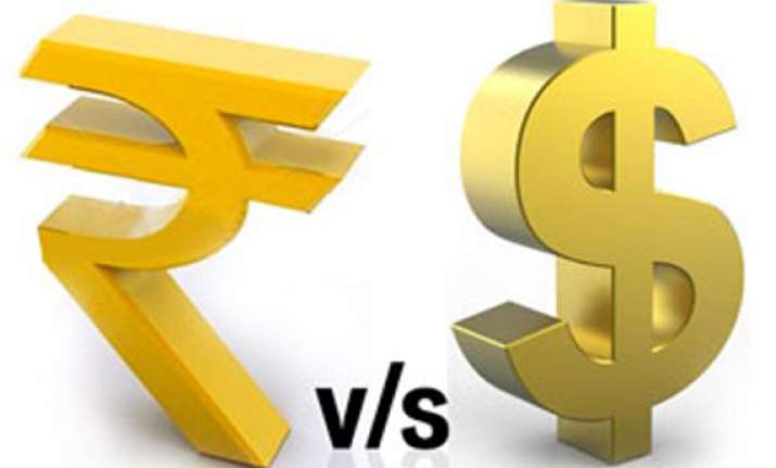 rupee falls to all time closing low of 57.15 against us