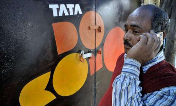 tata teleservices withdraws from cdma spectrum auction