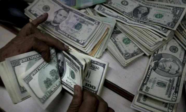 us dollar edges up against rupee