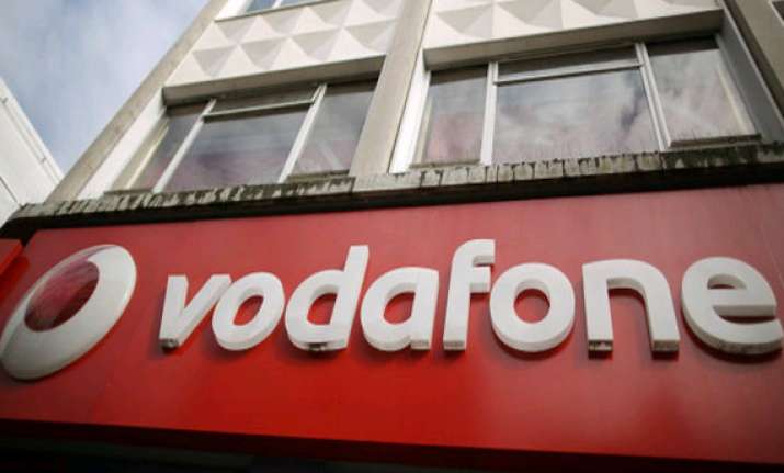 vodafone group may sell stake in bharti to comply with rules