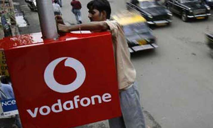 vodafone describes rs 11 000 cr tax as unjust