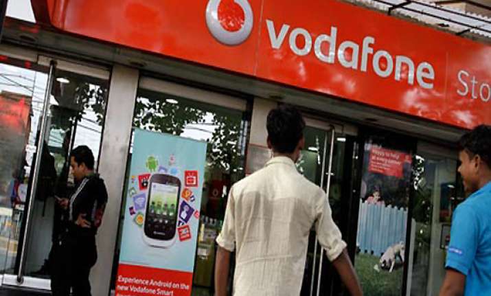 vodafone threatens international arbitration