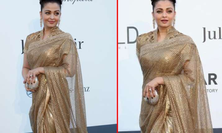 aishwarya rai glitters in golden saree at cannes view pics