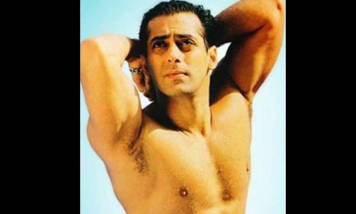 drunk salman gyrates with russian dancers inside a cage