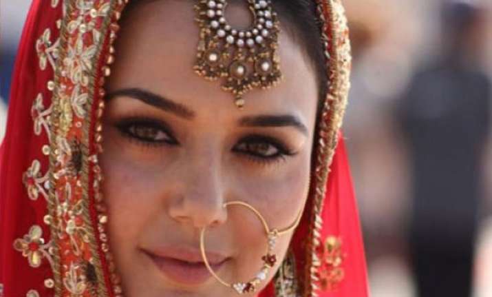 confirmed preity zinta to have twin wedding with gene