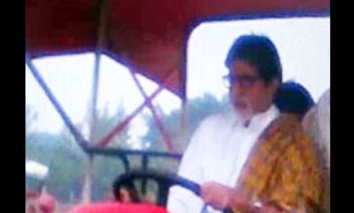 big b rides a tractor