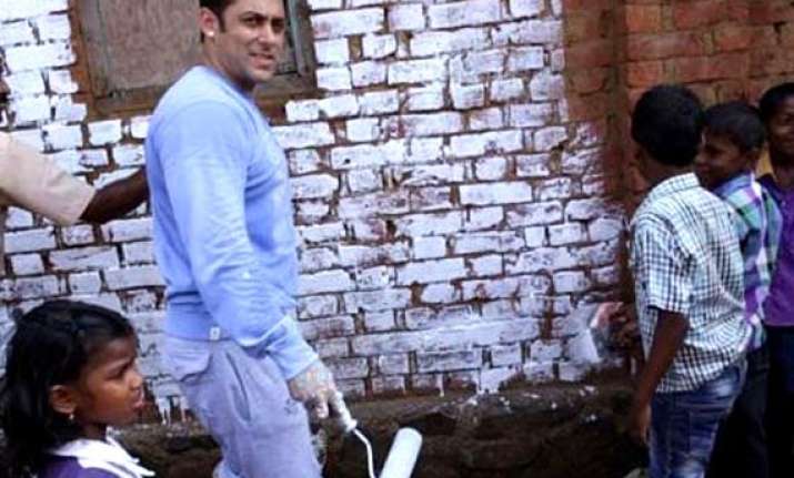 as salman khan wields the broom narendra modi tweets his